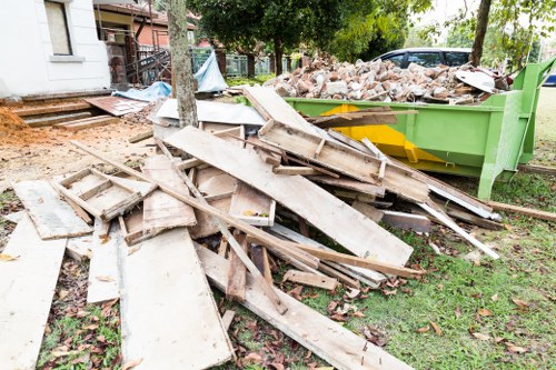 Construction site with builders waste removal container