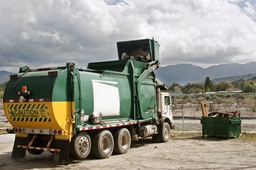 Waste being loaded into a skip in Barnet
