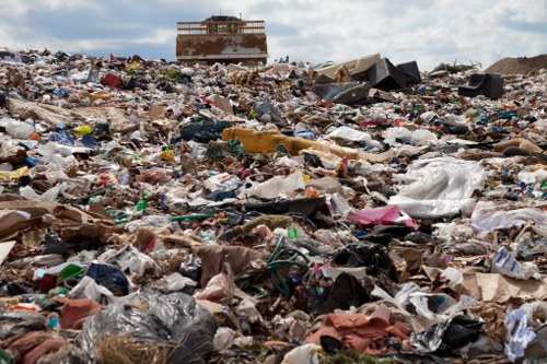 Waste removal trucks at a construction site
